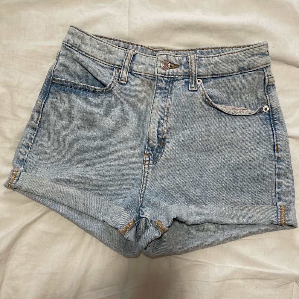 High rise light wash shorts.